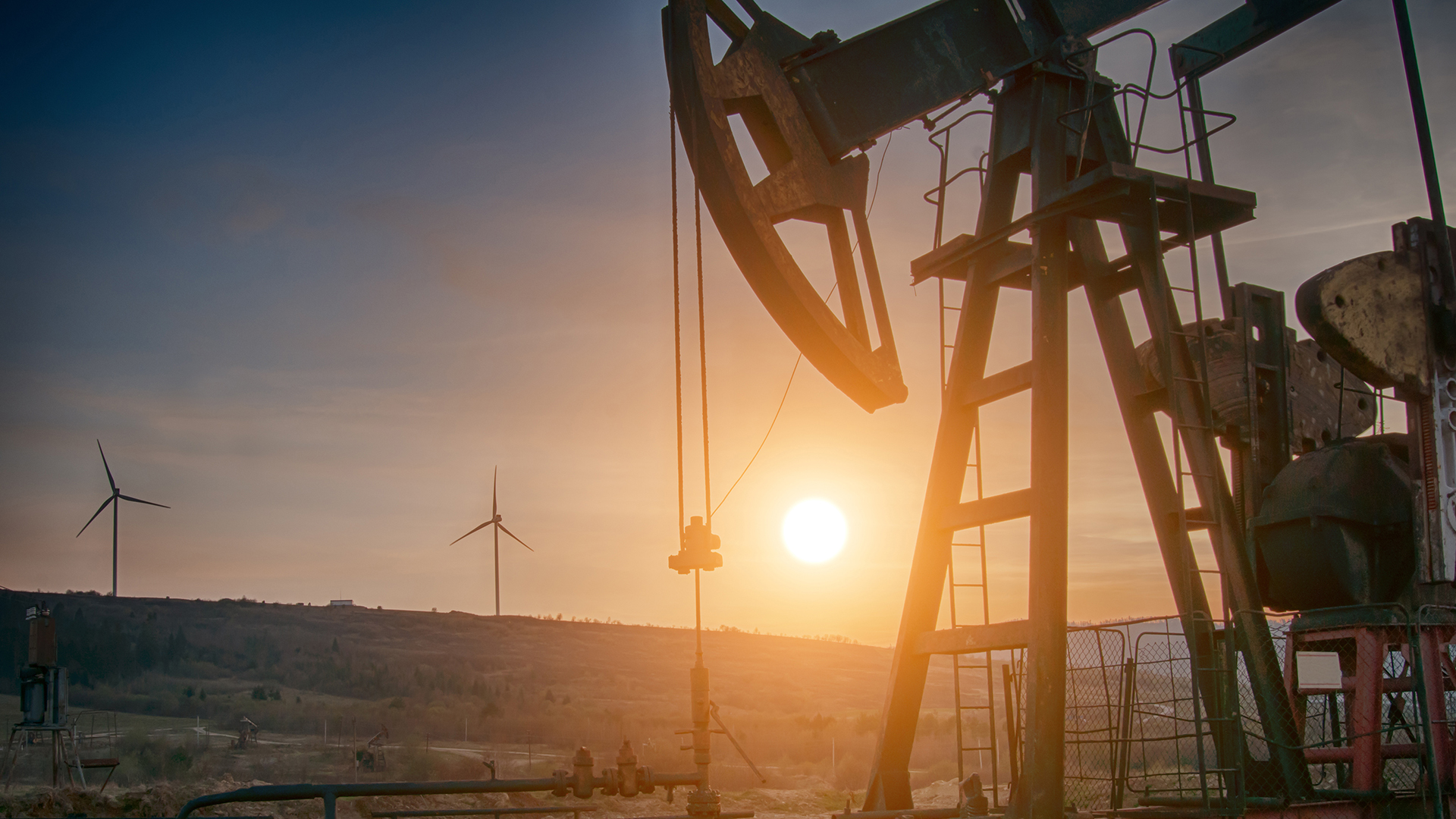 oil pump on orange sunset
